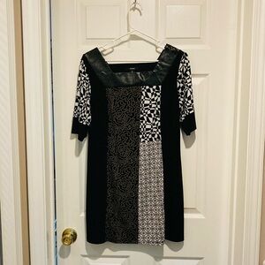 Cute mini multi-colored mini dress that is perfect for a night out on the town!